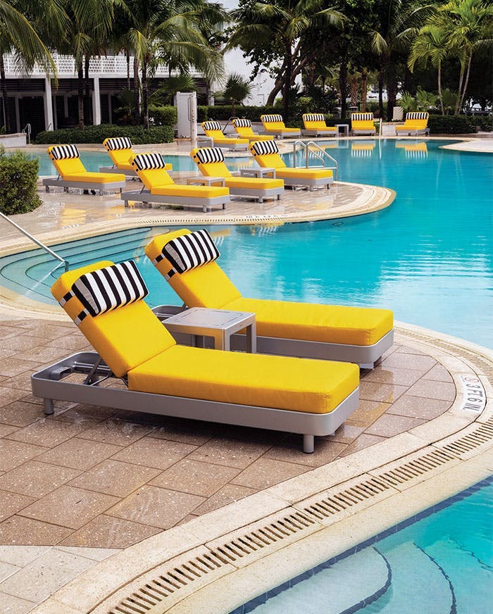 lounge chairs with yellow cushions